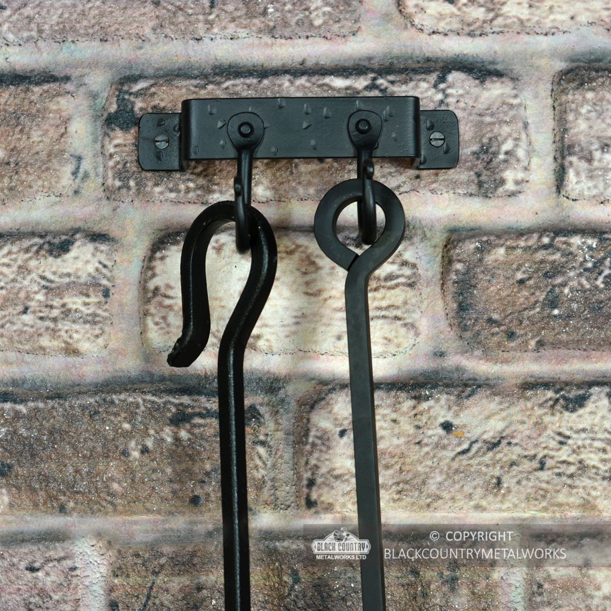 2 Hook "Blacksmith Style" Wall Mounted Fireside Tool Rack in Situ on the Wall holding tools