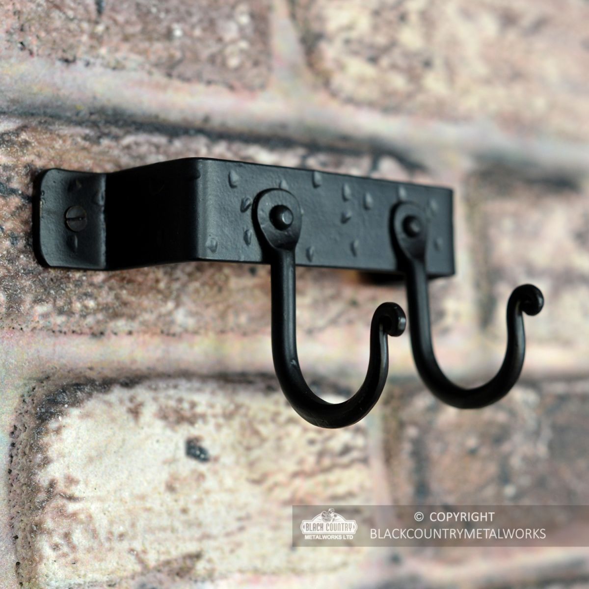 View of the hooks on the Fireside Tool Rack