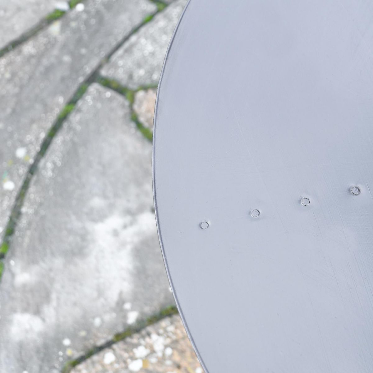 Close up of circular steel lid 