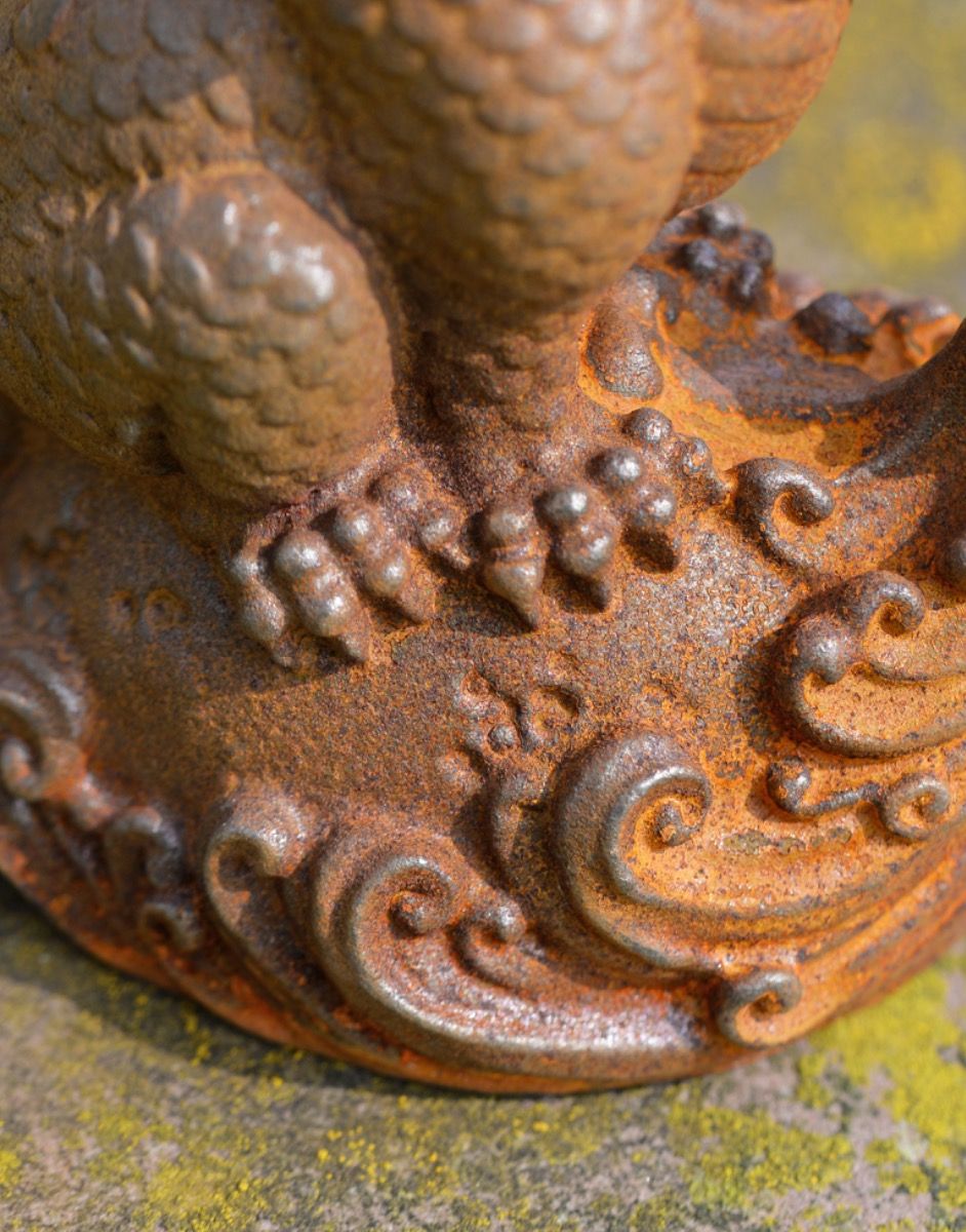 Close-up of Cast Iron Fire Breathing Dragon Sculpture