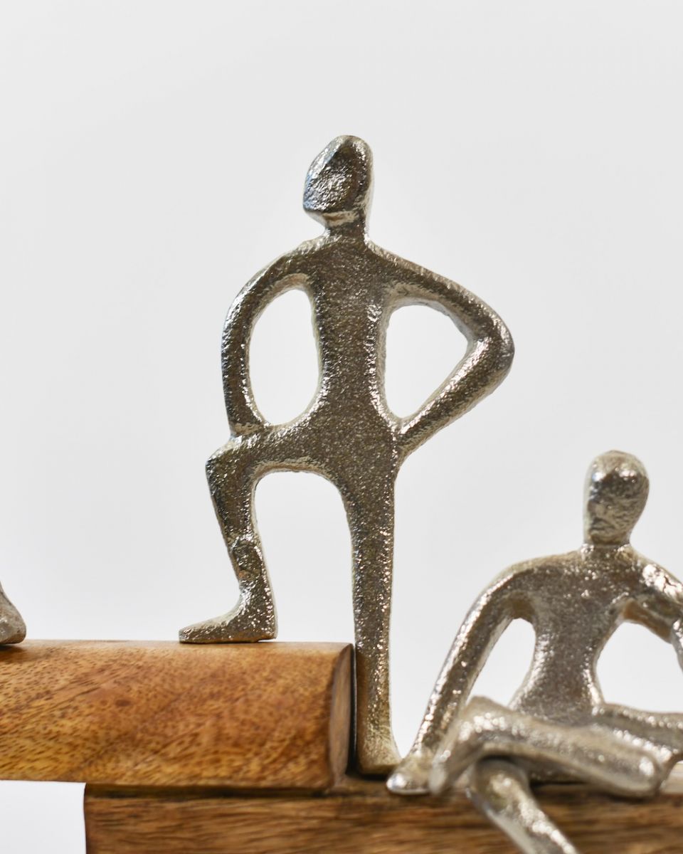 Close up of silver cast aluminium figure in art sculpture