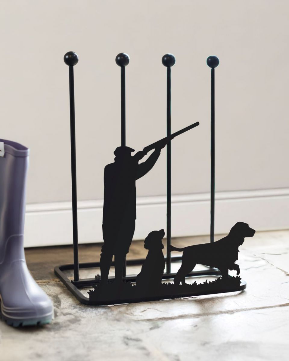Boot Rack with cream wall behind