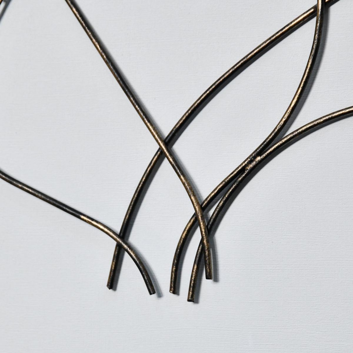 Close-up of the Bronze Finish on the Stems of the Leaves