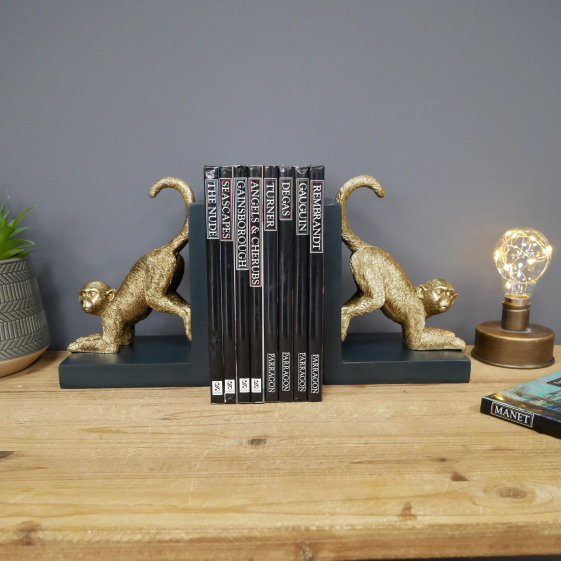 Gold Painted Monkey Bookends in Situ in the Home