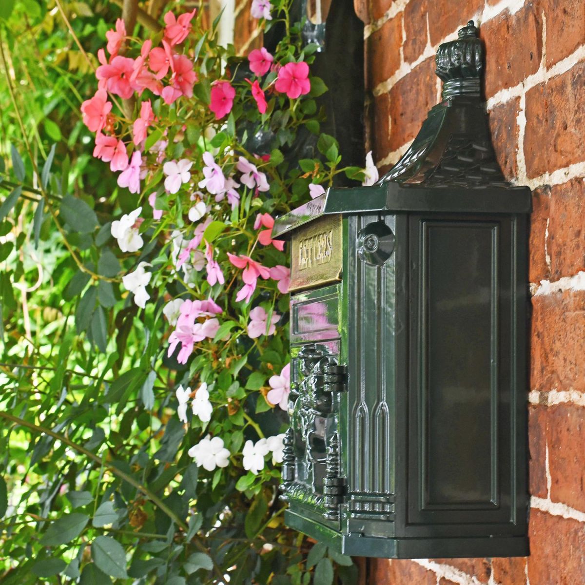 Side View of the Wall Mounted Post Box Mounted on a Brick Wall