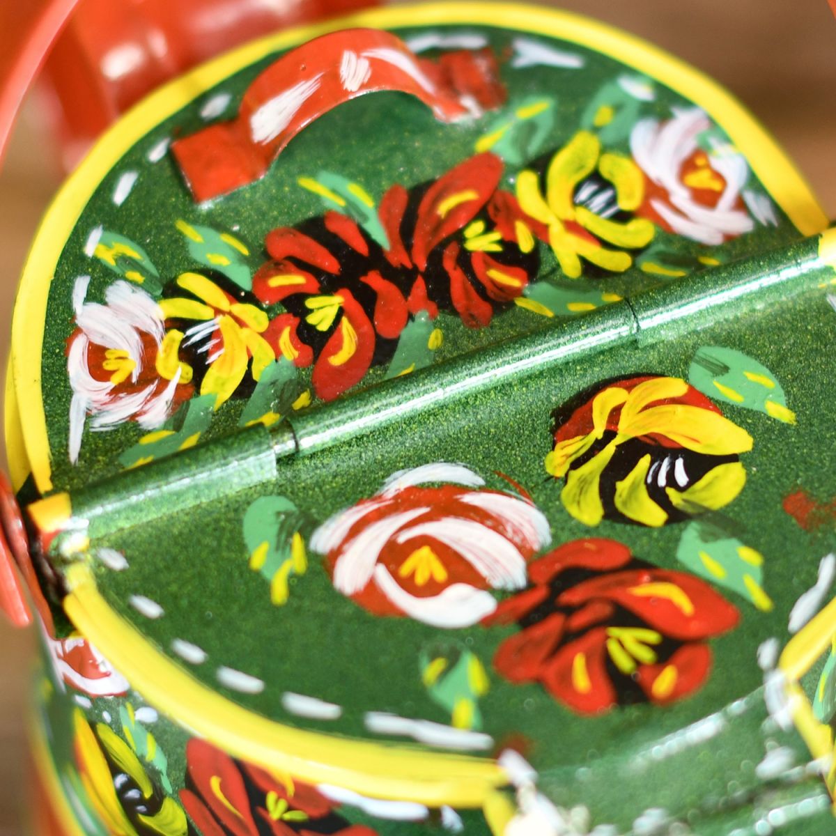 Close-up of the Hand Painted Floral Design on the Top of the Watering Can