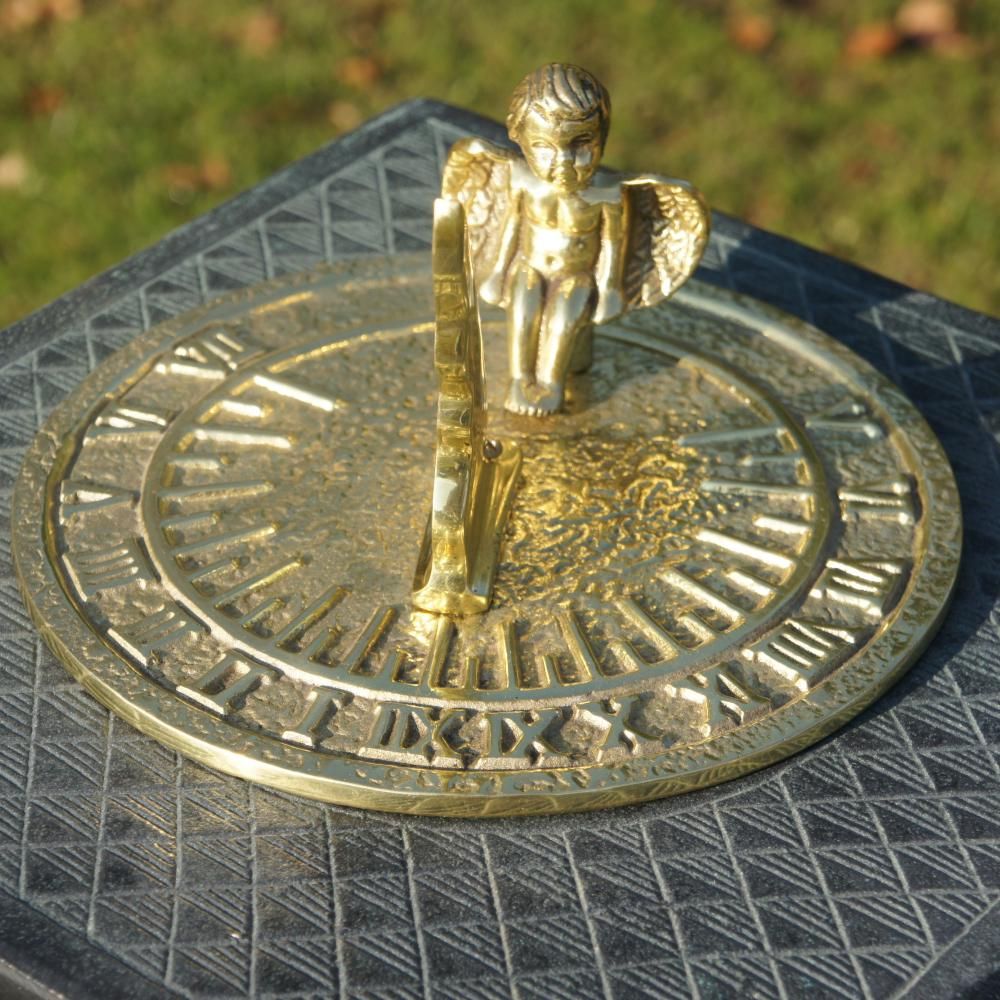 Guardian Angel Sundial in Situ on a Grey Sundial Column