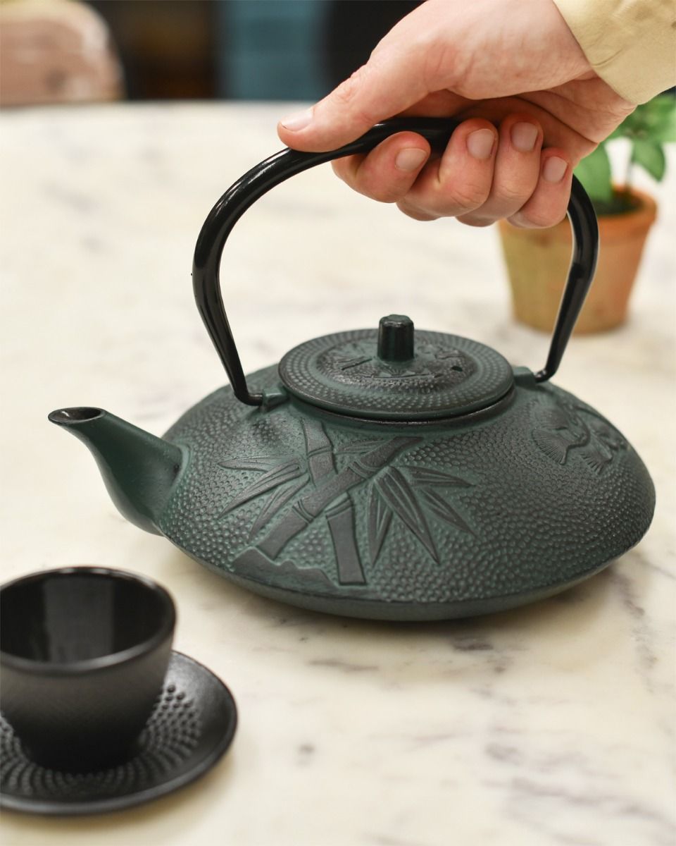 Scale Shot of Cast Iron Teapot 