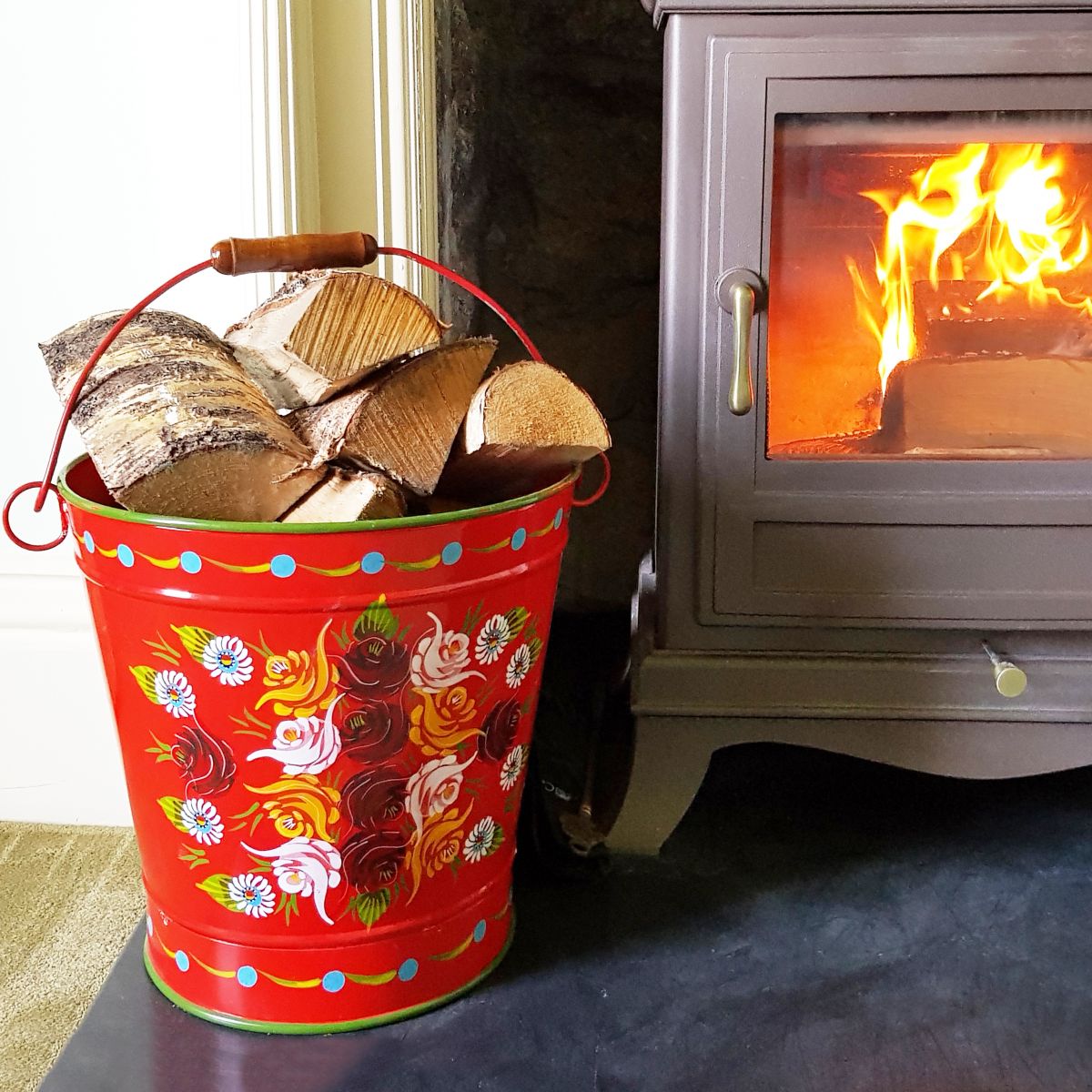 red Narrow Boat Style Bucket Log Holder in Situ
