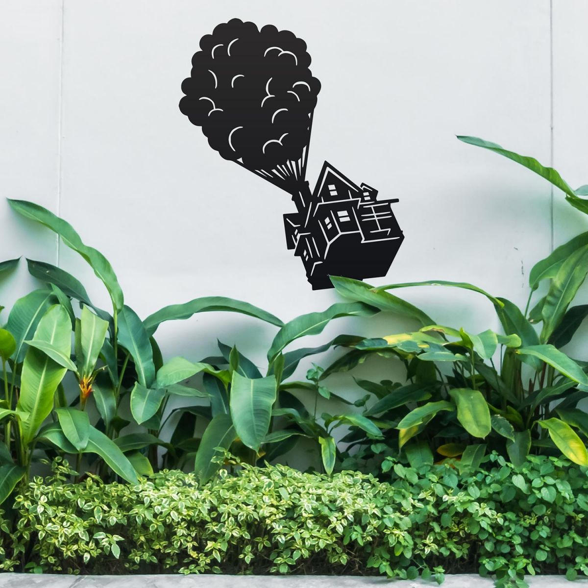 Floating House on Balloons Steel Wall Art in the Garden
