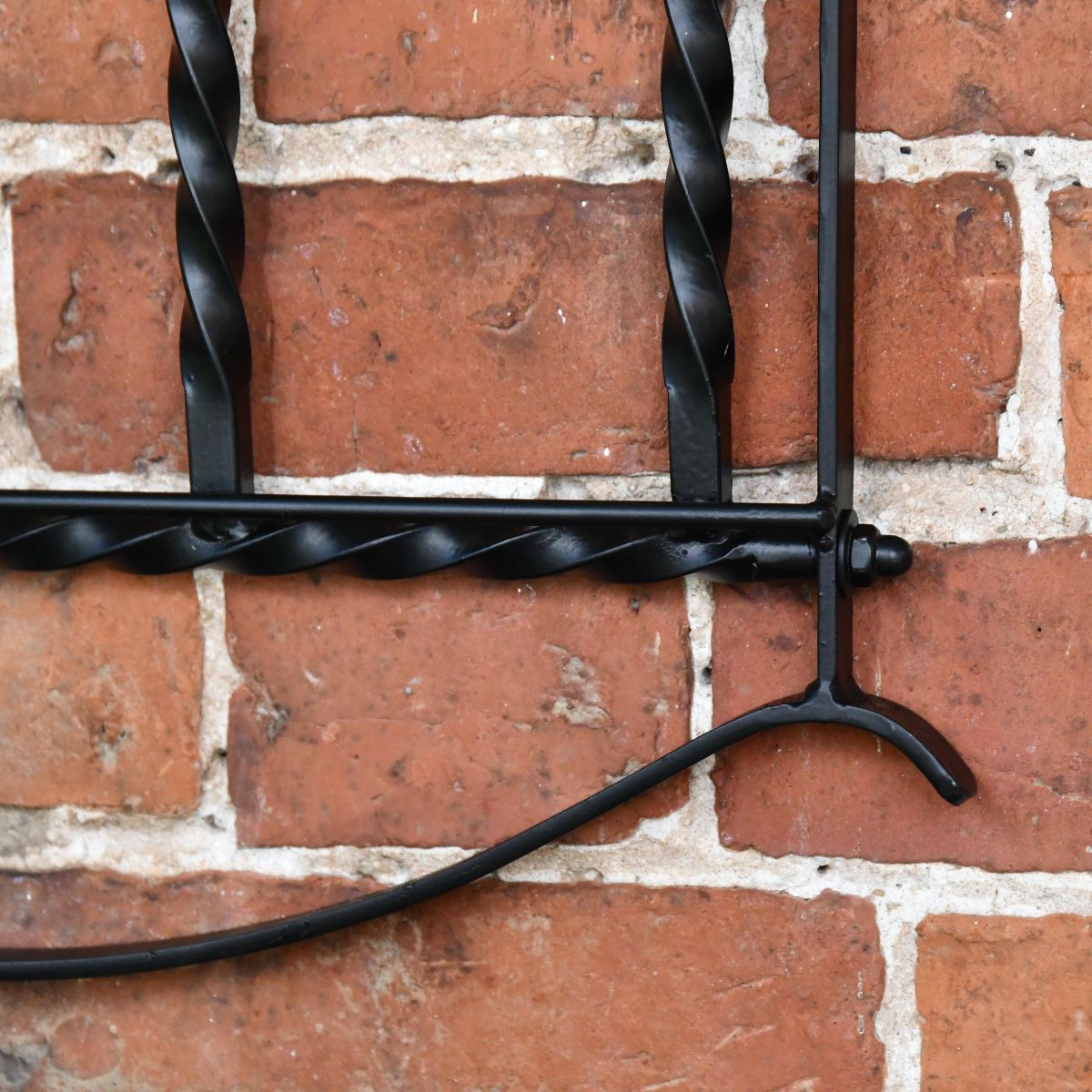 Closed up of wall mounted boot rack framework 