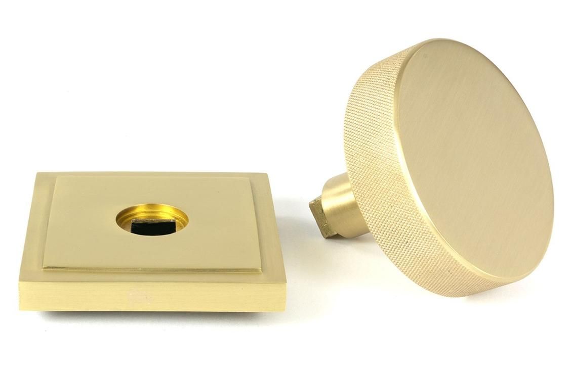 Close-Up of Individual Satin Brass "Temple" Square Centre Door Knob - 90mm