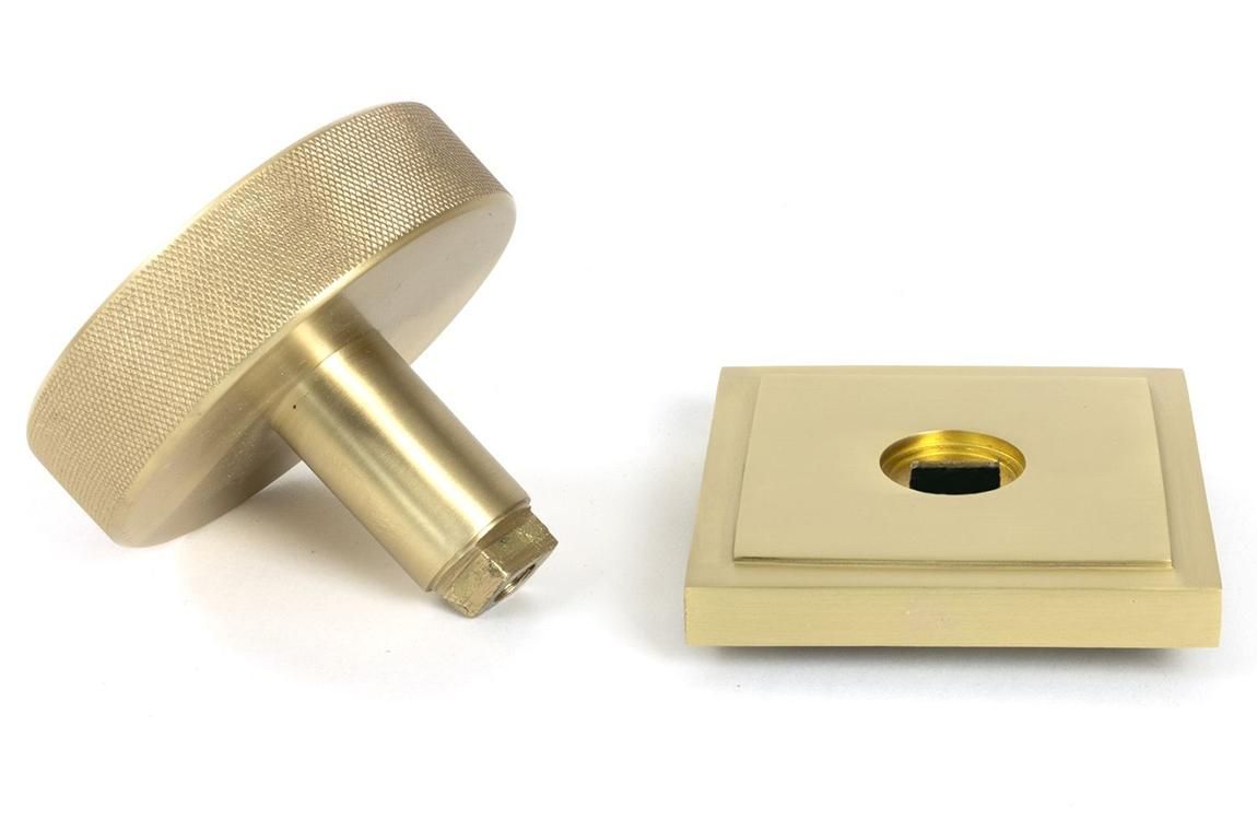 Close-Up of 90mm Individual Satin Brass "Temple" Square Centre Door Knob