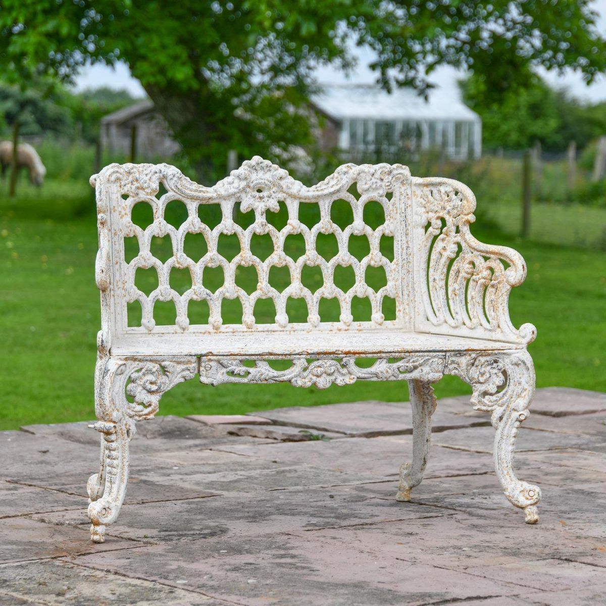 Ornate Cast Iron Garden Bench with Antique Cream Finish