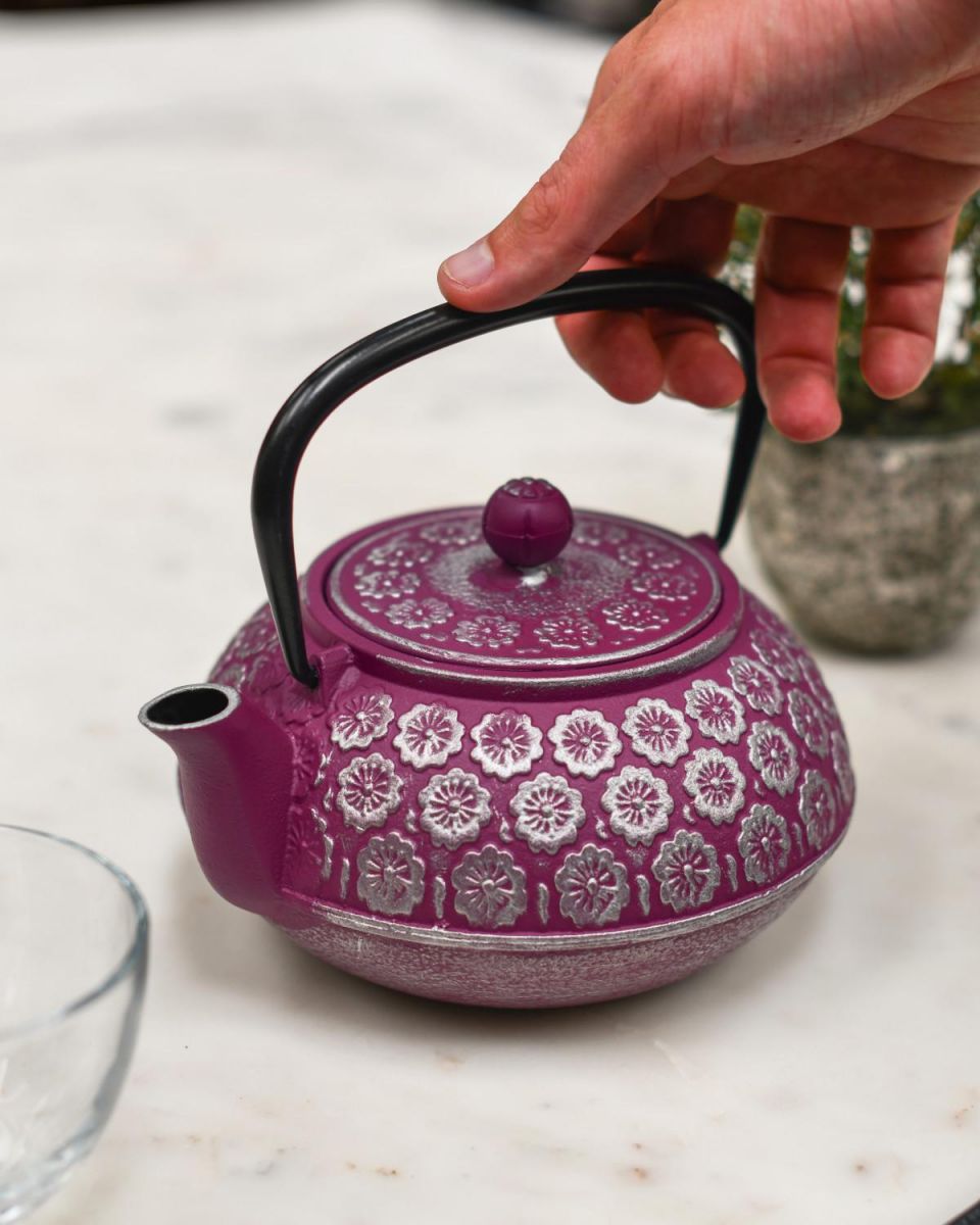 Scale Shot of Japanese Inspired "Boysenberry" Purple & Silver Cast Iron Teapot