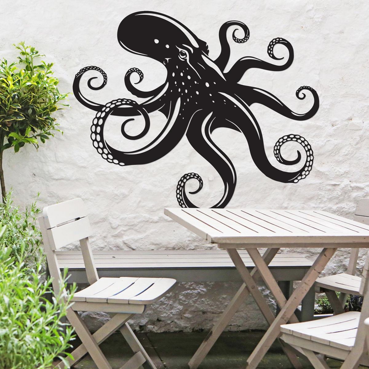 Octopus Wall Art in the Garden Above a Wooden Table & Chair Set