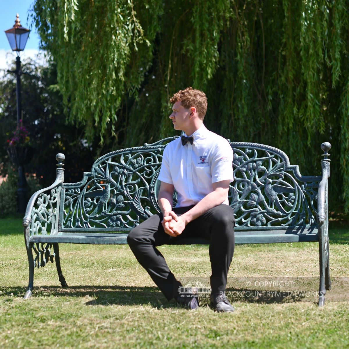 Large Rustic "Artemis" Ornate Bench With Gentleman Sitting