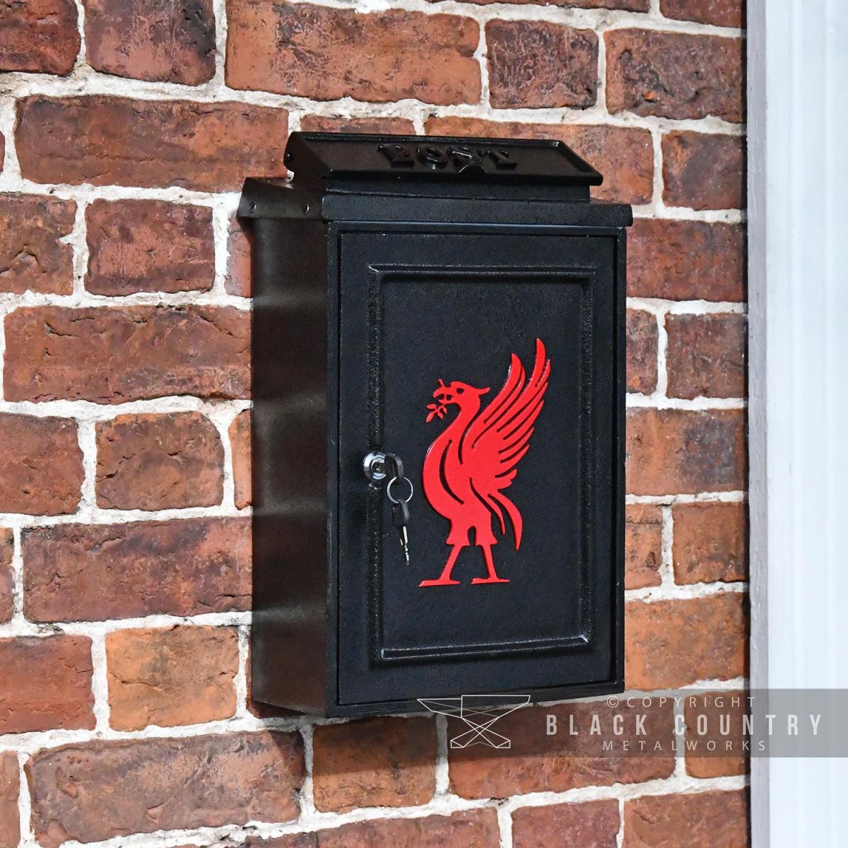 "Liver Bird" Wall Mounted Post Box in Situ on a Brick Wall