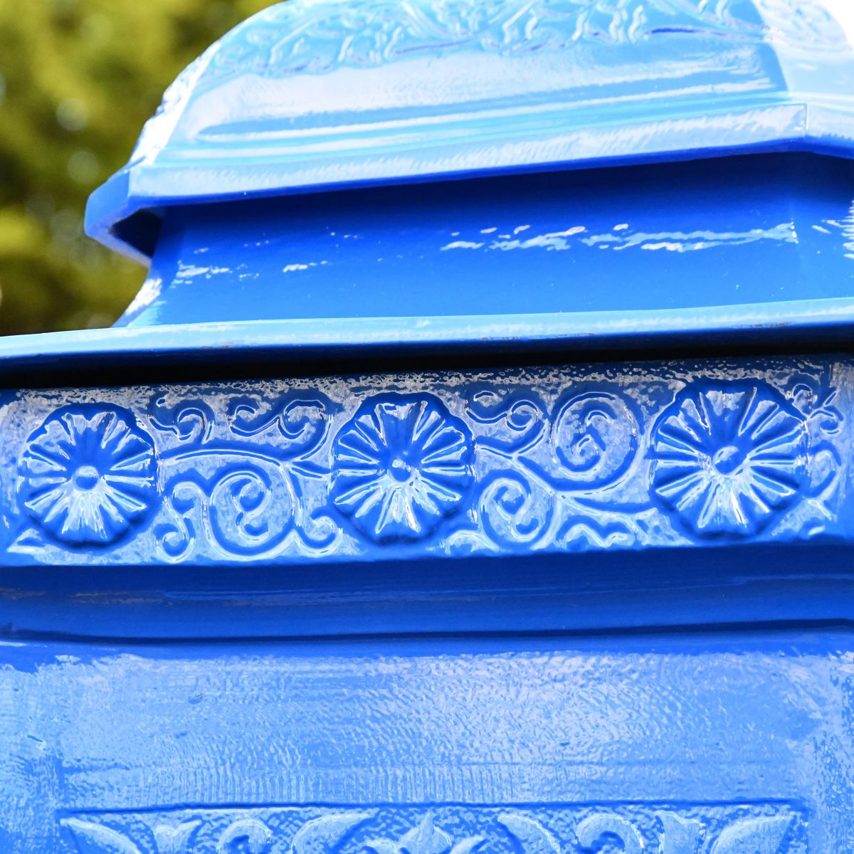 Close up of flower motif on "Coastal Surf" Camden Post Box