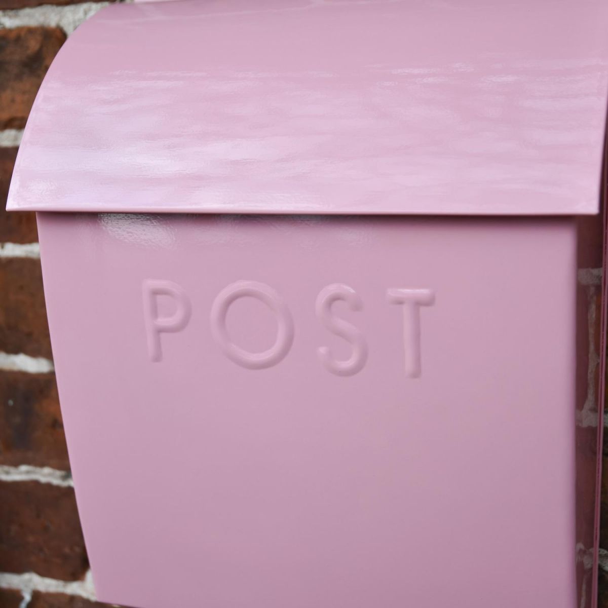 Close up of embossed "POST" lettering 