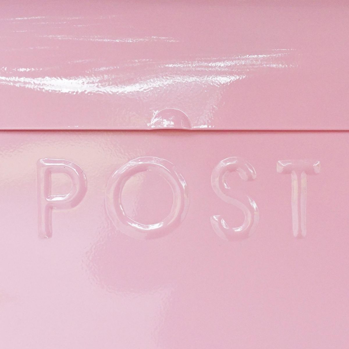 Embossed "POST" lettering 
