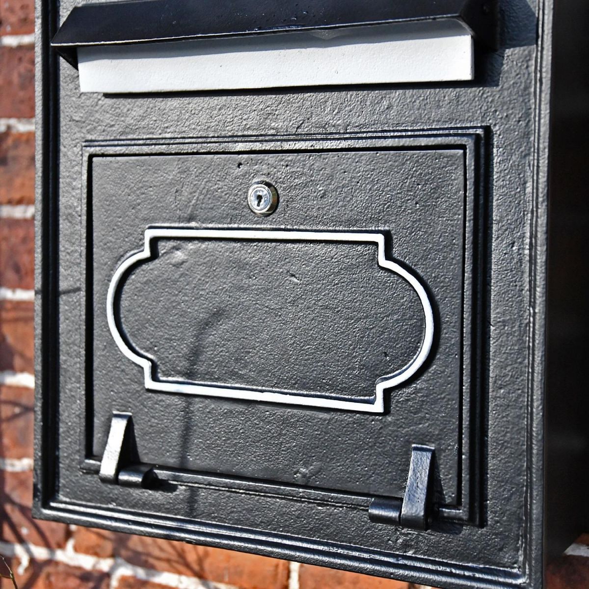 Close up of decorative detailing on Osteler Splendour Post Box