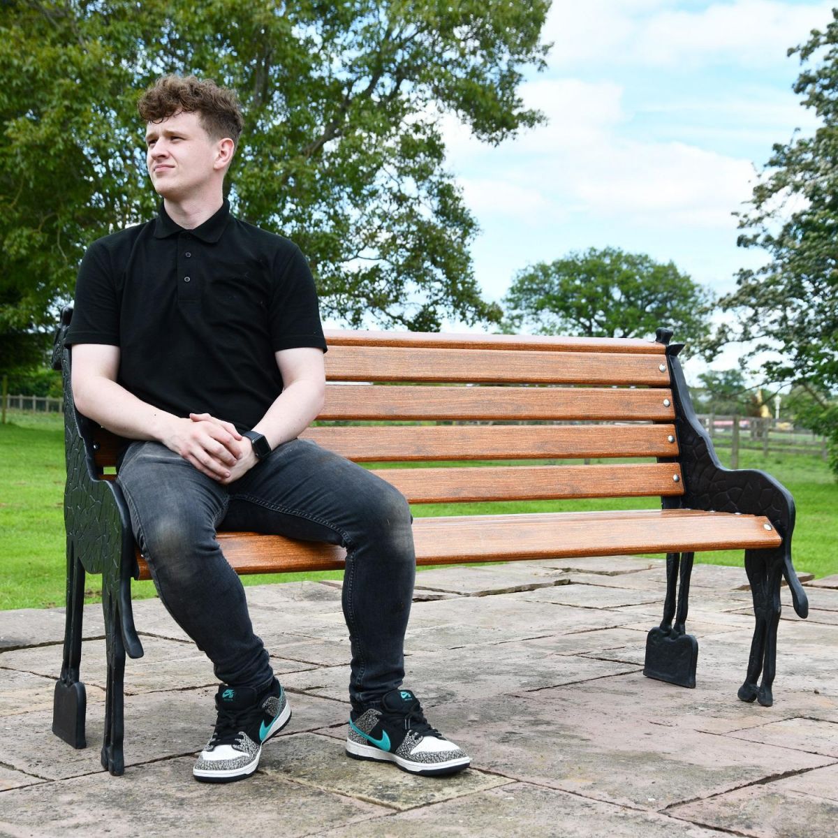 Male on bench for scale 
