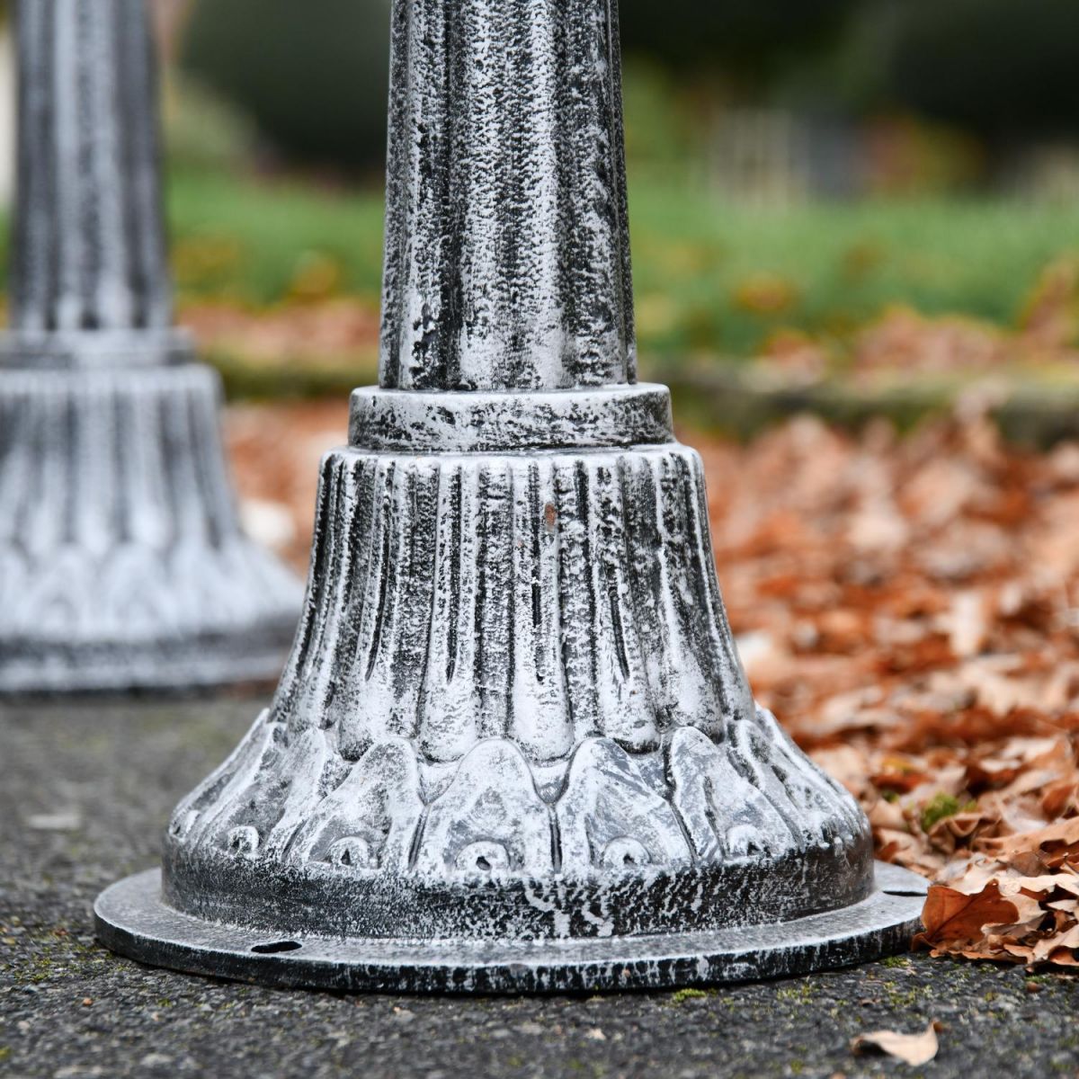 Close up of base on antique silver driveway 