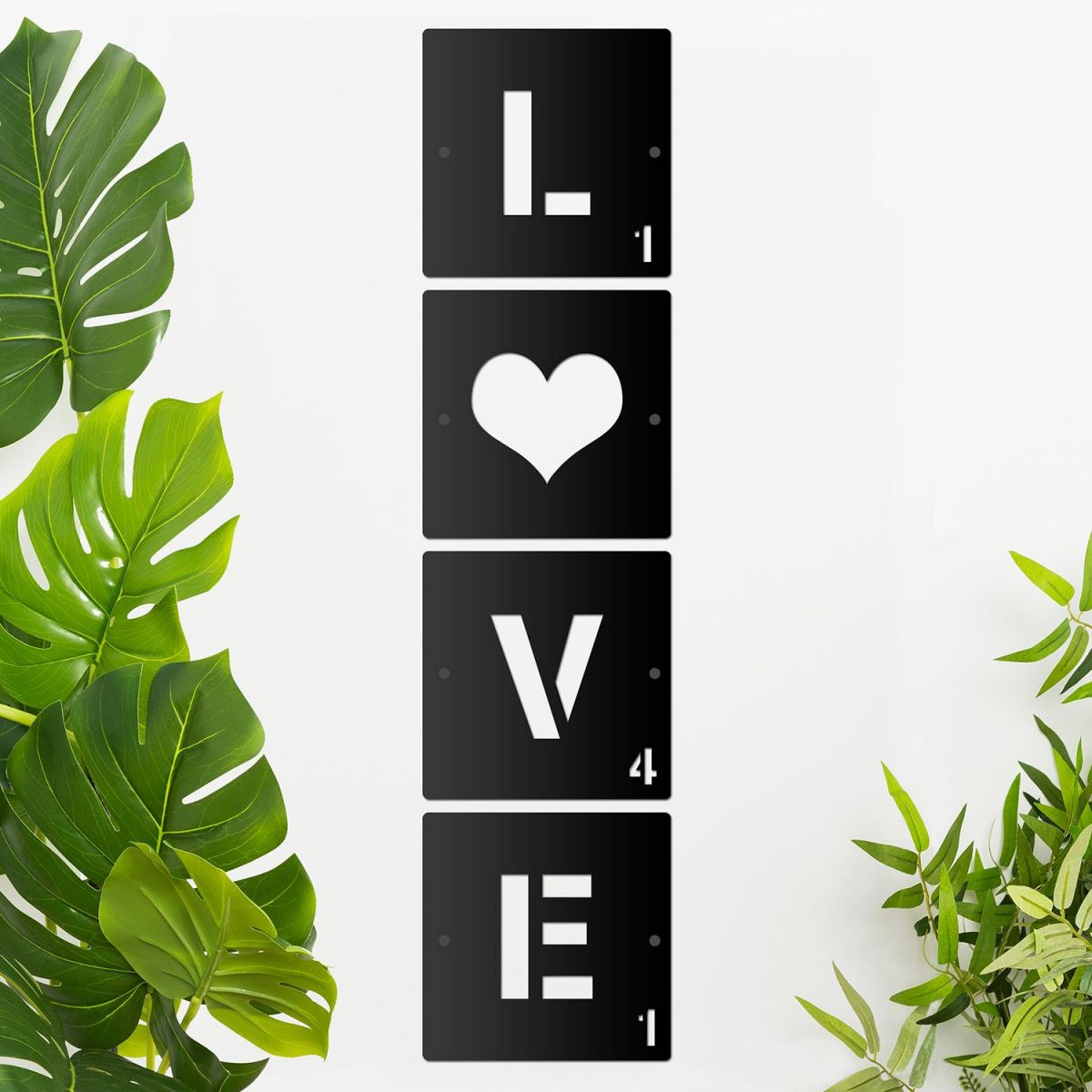 "LOVE" Scrabble Square Letters on a Cream Wall