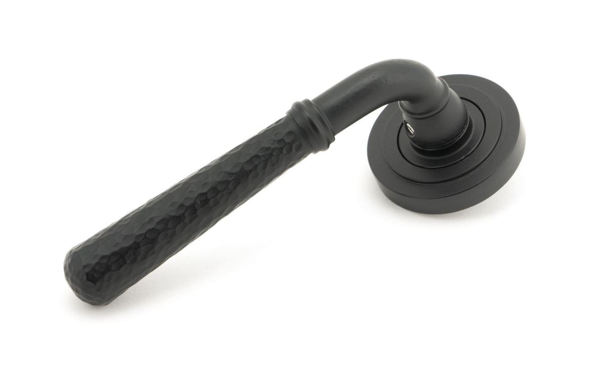 Matte Black Hammered Unsprung Lever Door Handle on Art Deco Rose Front