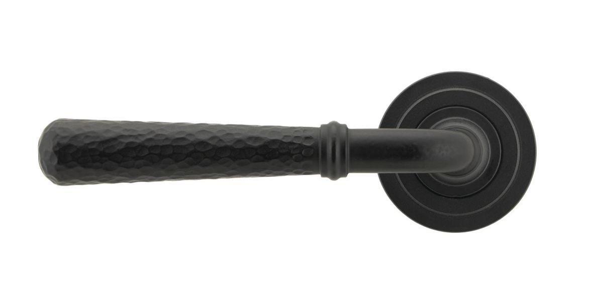Matte Black Hammered Unsprung Lever Door Handle on Art Deco Rose