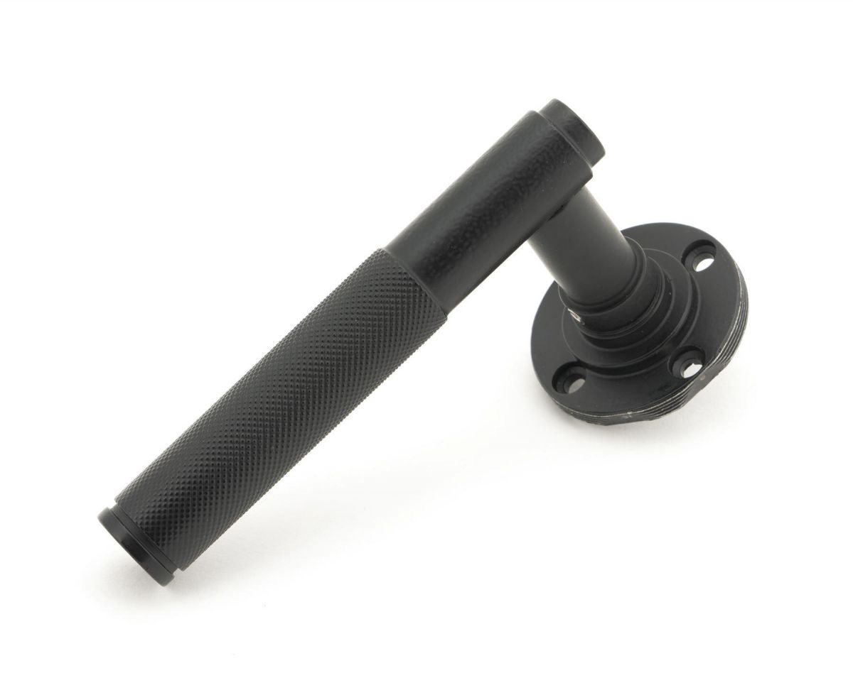 Matte Black Textured Lever Door Handle on Beehive Rose Back