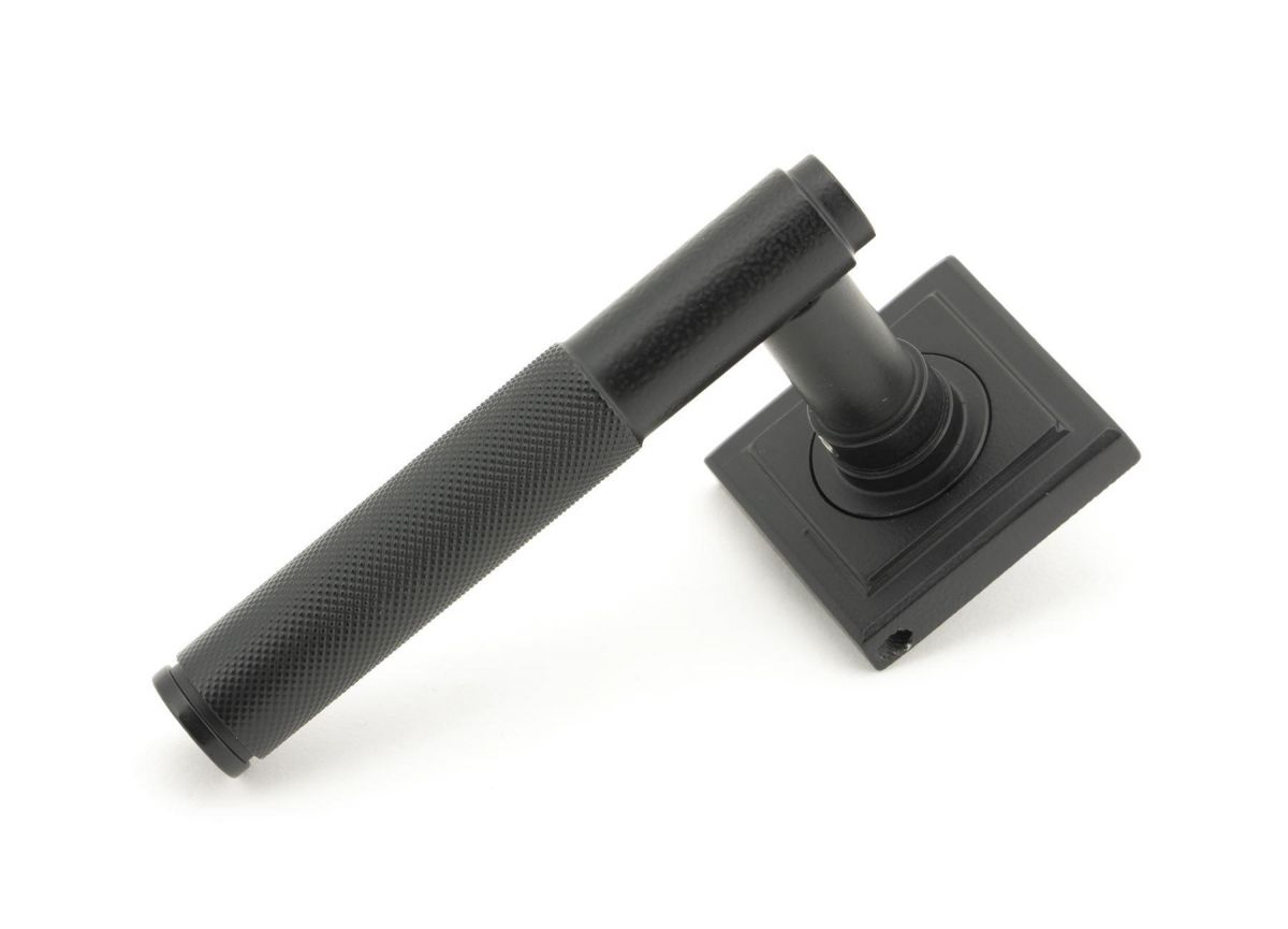 Matte Black Textured Lever Door Handle on Square Rose