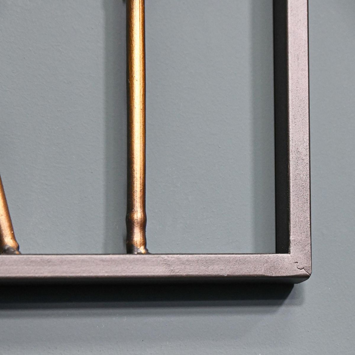 Metal Frame Around the Metal Bamboo Metal Wall Art