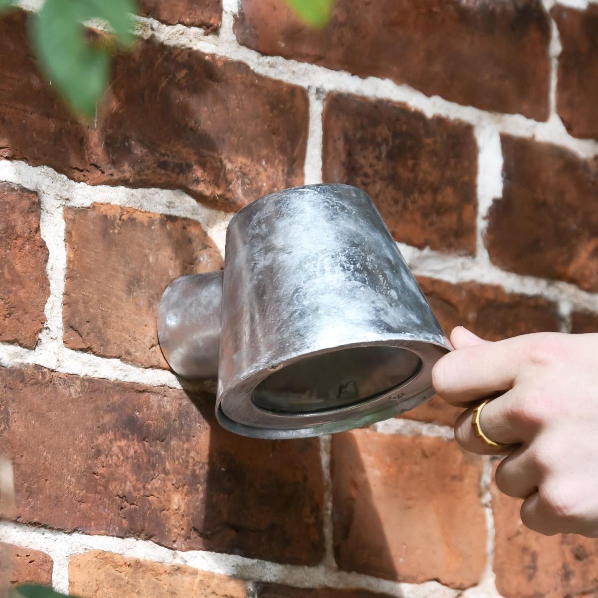 Scale Shot of Modern Galvanised Steel Downward Wall Light