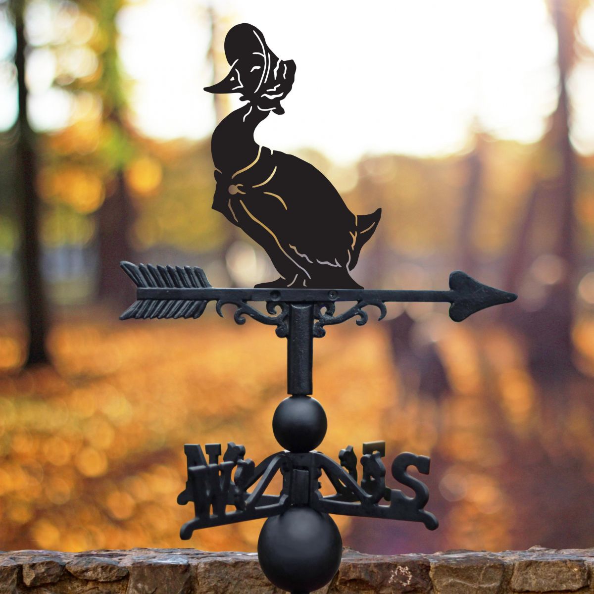 Mouse on Cotton Reel Weathervane in Situ in a Woodland Setting