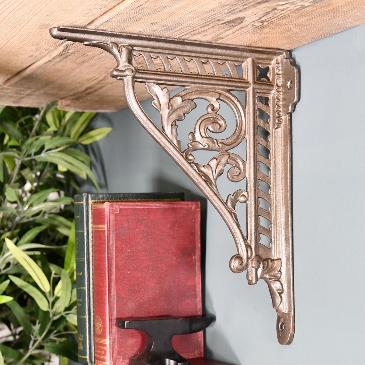 Natural Iron Cast Iron Shelf Bracket in Situ Holding a Wooden Shelf