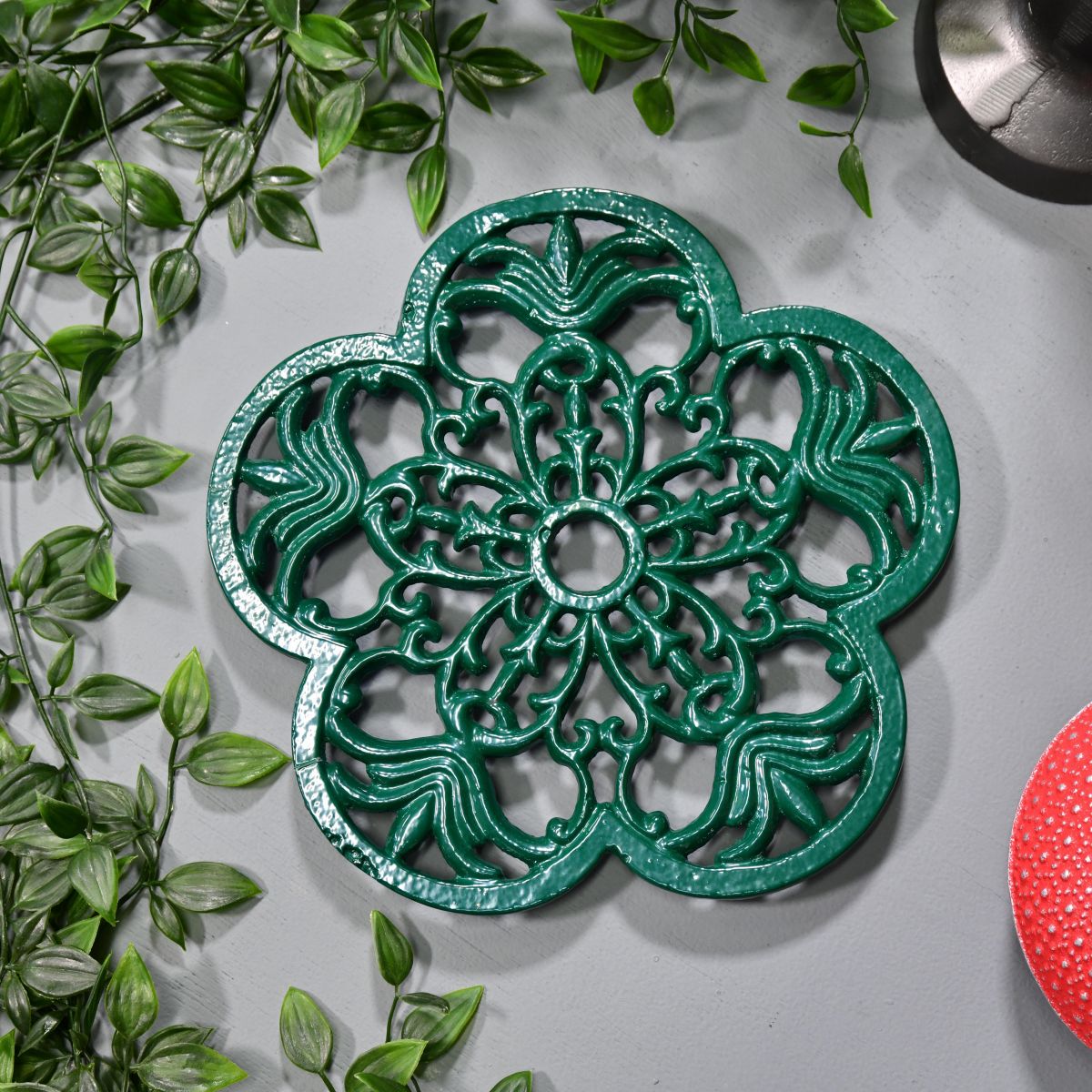 Cast Iron Flower Petal Trivet in Green in Situ
