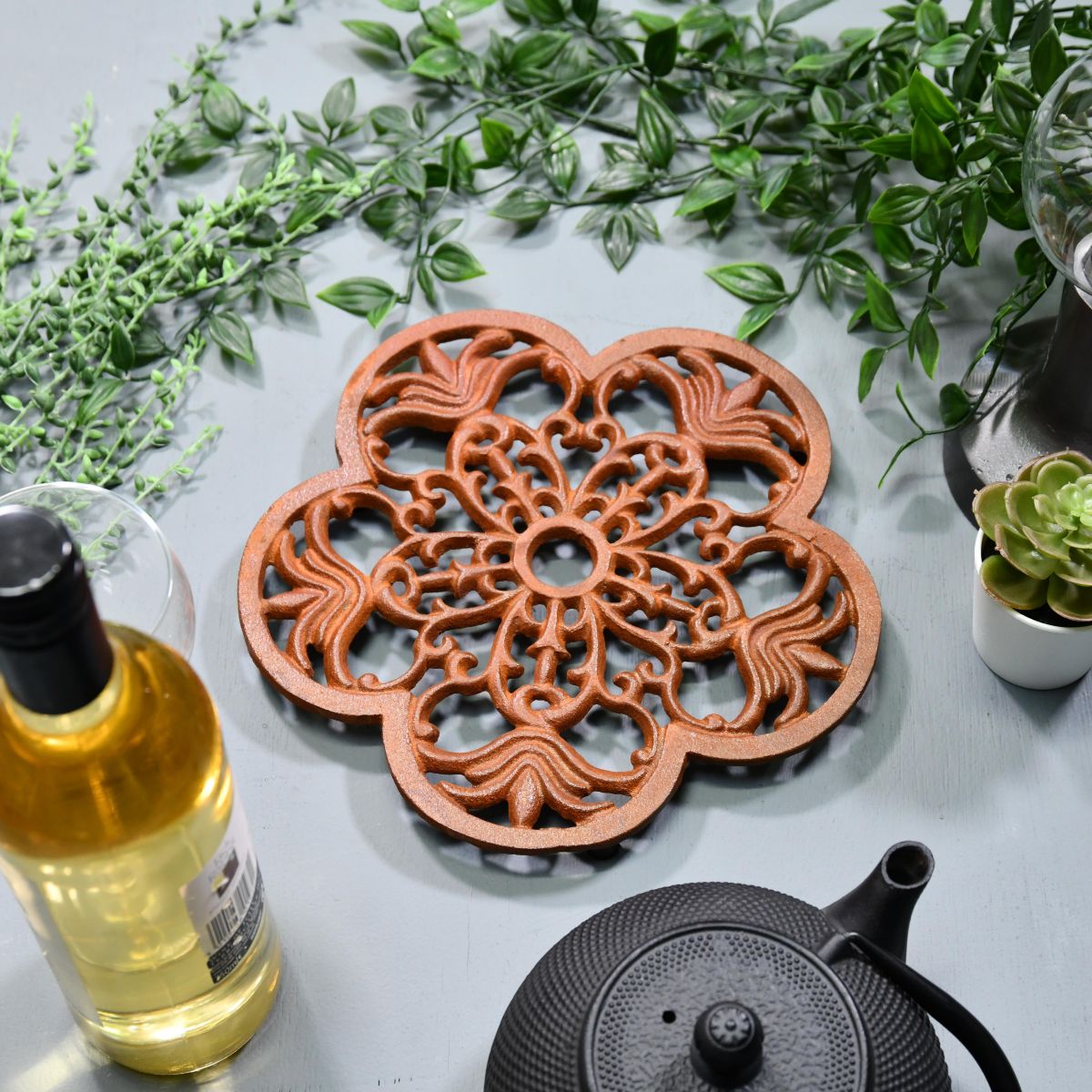 Rustic Cast Iron Flower Trivet in Situ