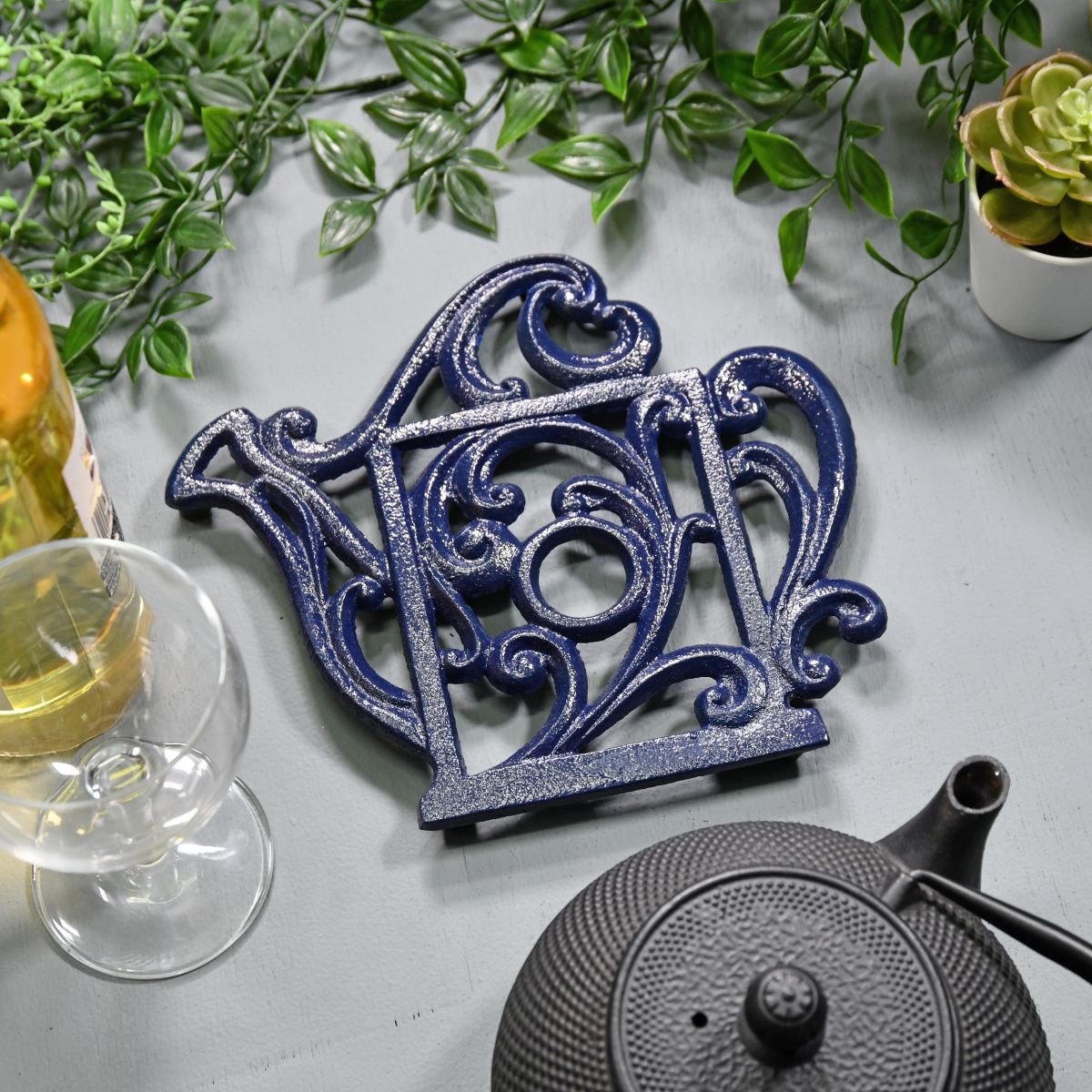 Blue Cast Iron Kettle Trivet in Situ with Teapot