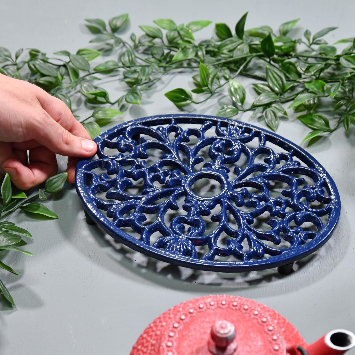 Blue Cast Iron Oval Trivet to Scale