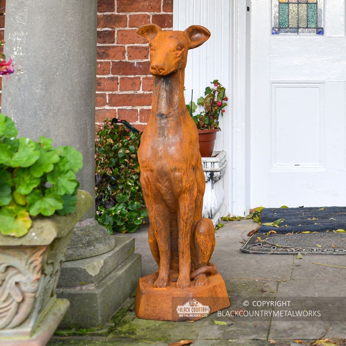 Rustic Cast Iron Greyhound Dog Sculpture Sitting Outside the Front Door