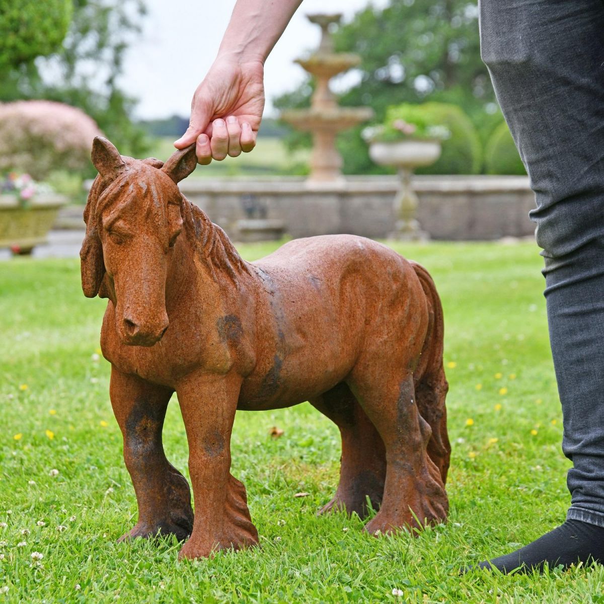 Cast Iron Rustic Sculpture with Male for scale 
