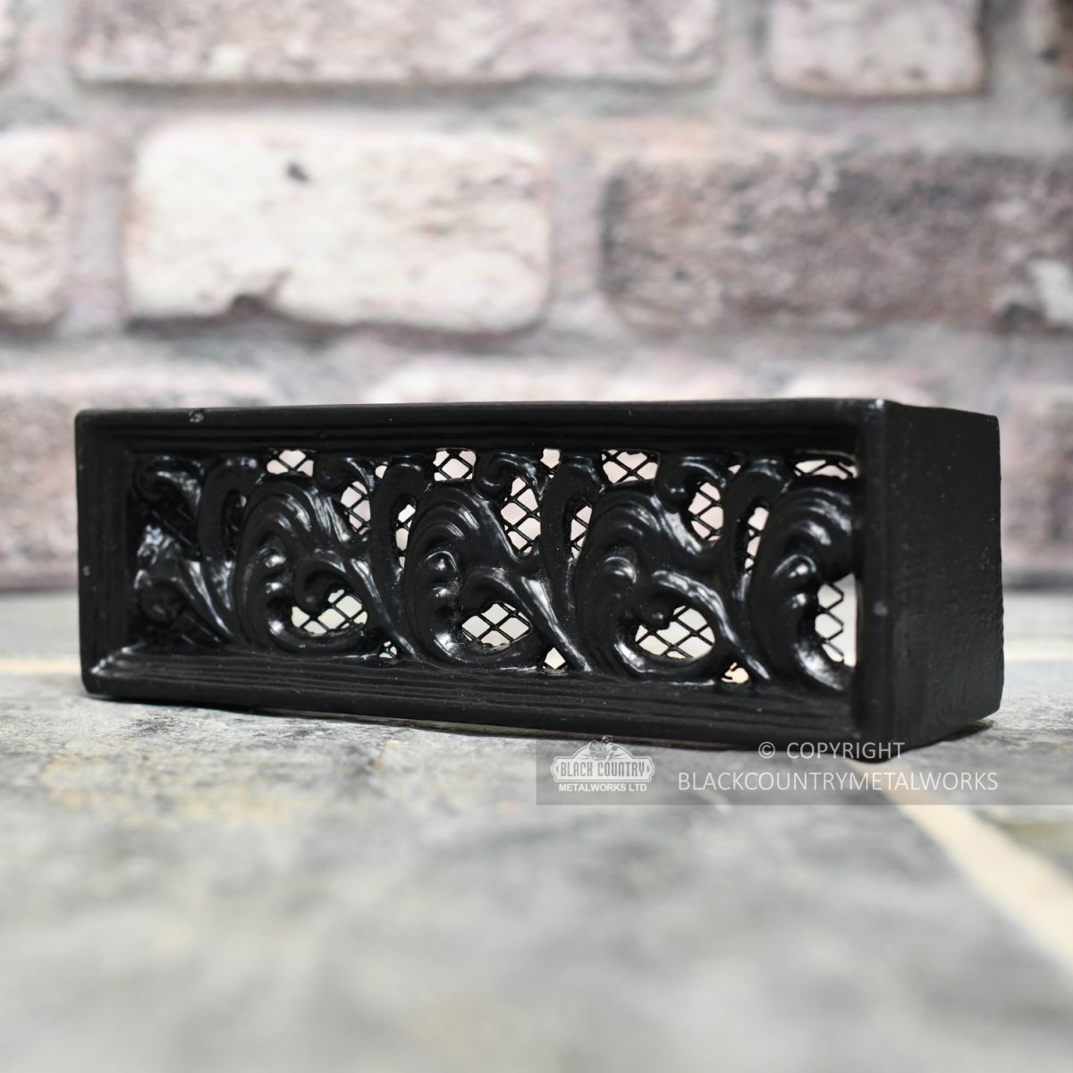 Ornate Air brick cast from iron