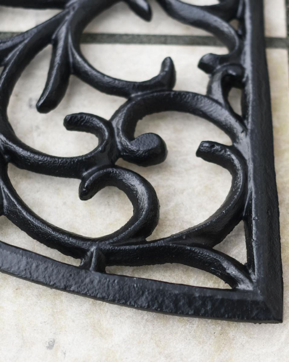 Close-Up of Black Ornate Cast Iron "Sunrise" Semi Circle Door Mat