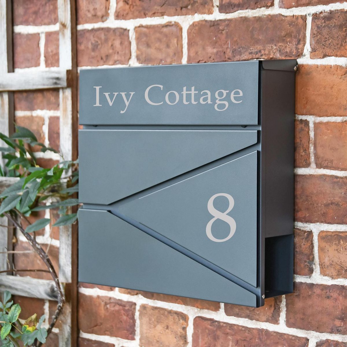 Personalised Black "Leading Edge" Wall Mounted Post Box & Newspaper Holder in Situ Mounted on a Brick Wall