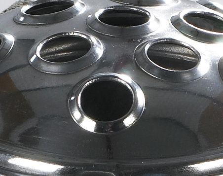 Close up of Flower holes on lid