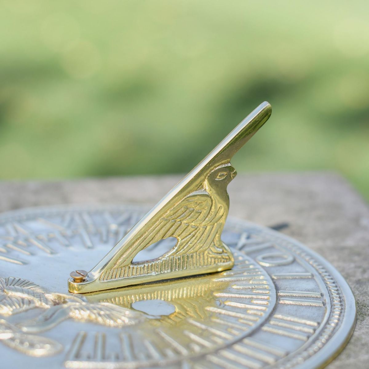 Close-up of Polished Brass Gnomon on Hummingbird Sundial