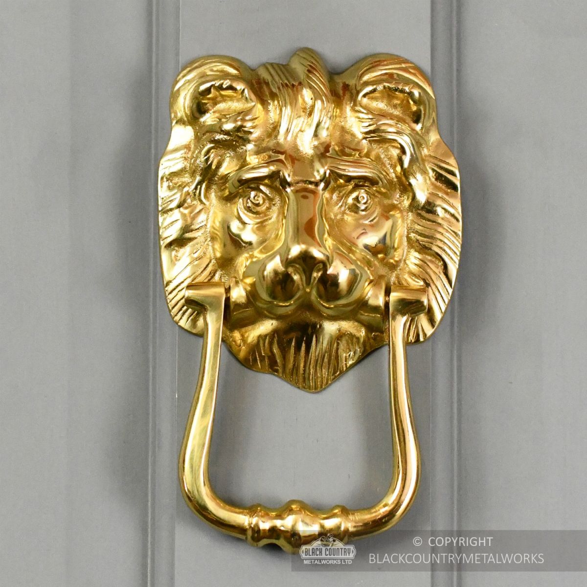 Polished Brass Mayfair Lion Door Knocker On Grey Door