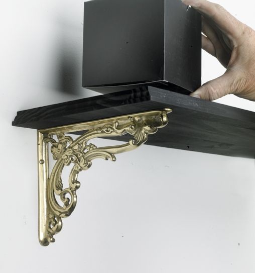Ornate “Victorian Amalina” in Situ Holding Up a Wooden Shelf